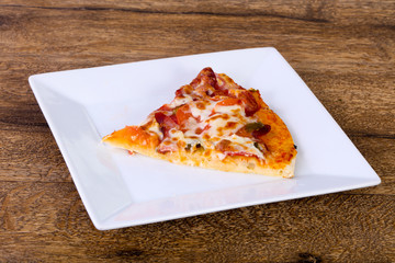 Pizza with sausages and tomato
