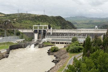 The Roxburgh hydroelectric power dam spilling excess water from one of its three spillways. Clutha...