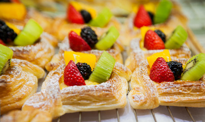 Delicious cake with cream and berries