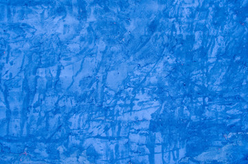 embossed blue shabby wall. grunge background