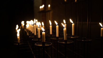 Candles in the dark church.