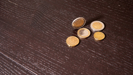 Euro coins on the table.