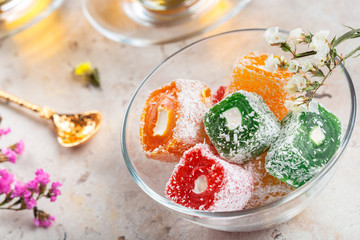 various pieces of turkish delight lokum and black tea