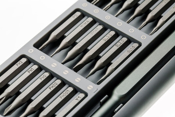 bits for screwdriver. Tool set for household use. Nozzles and adapters for screwdrivers. Head...