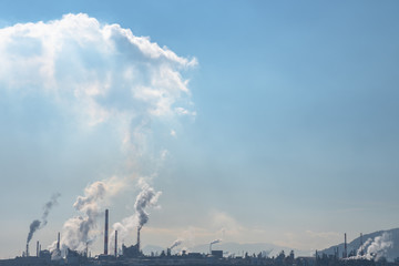 It is a view overlooking Otake industrial area from around Kuga station. You can see the chimney of...