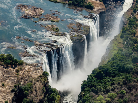 Awesome aerial view of Victorian waterfalls. View from helicopter. The Victoria Falls in Zimbabwe. © murmakova