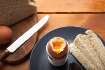 boiled egg for breakfast with white bread top view