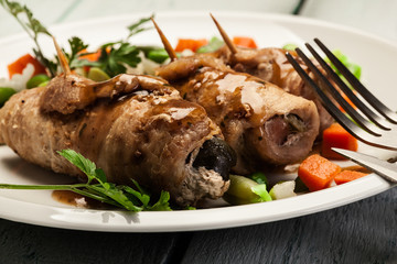 Pork rolls and vegetables