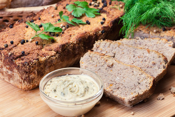 Traditional delicious meat pate with chicken liver on cutting board