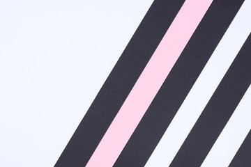 striped modern white, pink and black abstract background with copy space