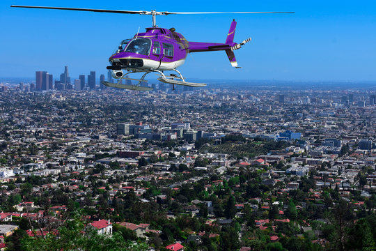 Helicopter Flying Over The City