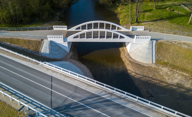 Pedistrian and auto bridge throught the river Vircava in Mezciems, Jelgava. Latvia. 