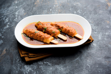 Soya Chaap Curry served in a bowl. Healthy recipe popular in India and Pakistan