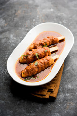 Soya Chaap Curry served in a bowl. Healthy recipe popular in India and Pakistan