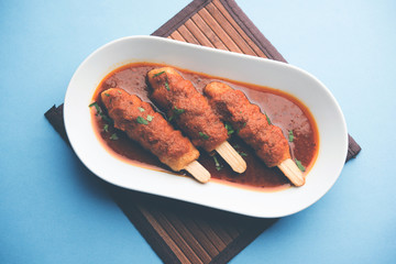 Soya Chaap Curry served in a bowl. Healthy recipe popular in India and Pakistan