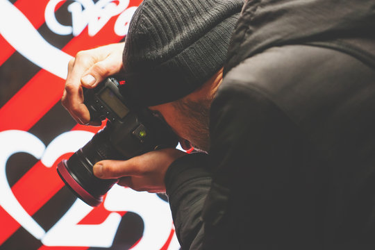 Large Professional Camera In The Hand Of The Photographer At Night, Retro Toned