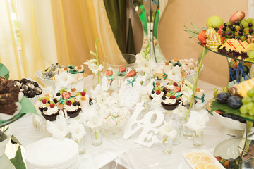 Different kinds of baked sweets on a buffet