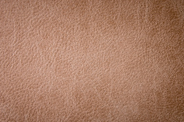 Textured background surface of leather upholstery furniture close-up. burlap brown color fabric structure