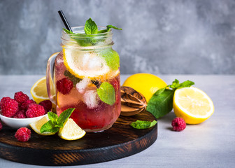 Raspberry lemonade in mason jar.