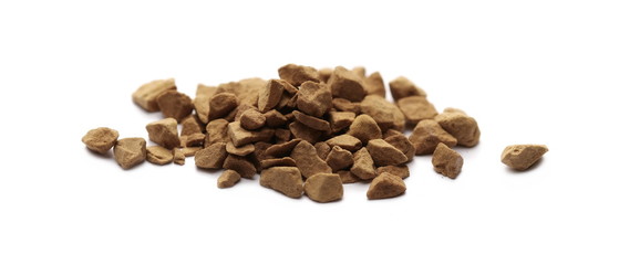 Instant coffee granules, grains isolated on white background and texture