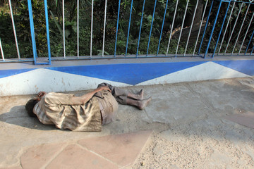 Homeless people sleeping on the footpath of Kolkata