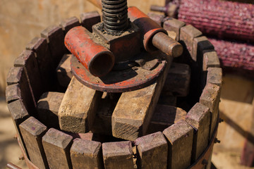 Wine-making. Technology of wine production. The folk tradition of making wine. Wine production in Moldova. The ancient tradition of grape processing. The squeezer is used to press the wine. 