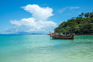 traditional thai boat in a bay of the Koh Racha Yai island in Thailand at the Phuket