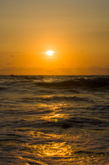 Amazing sea sunset, the sun, waves, clouds