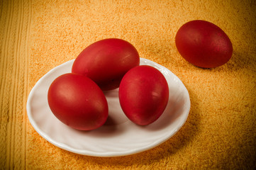 traditional Russian Easter cake with icing and dyed eggs