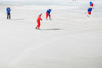 an open air hockey stadium game in winter in Siberia