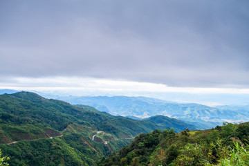 Mountain with sky scenery between the way