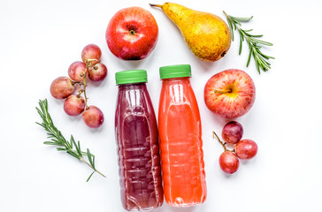 multifruit drink in plastic bottle on white background top view 