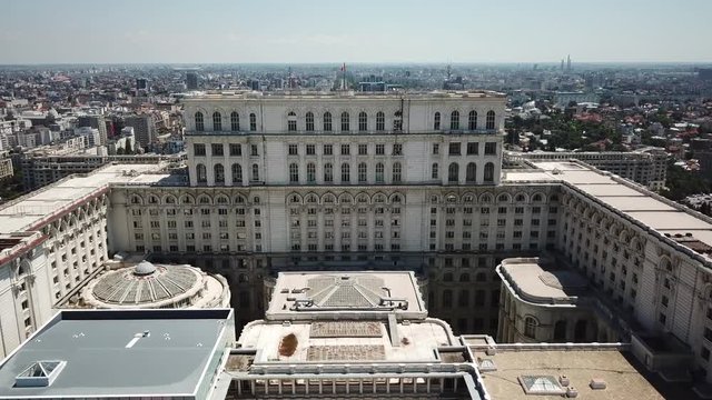 Bottom to Top & close view - Palace of the Parliament in Bucharest Romania. 2nd largest administrative building in the world. Summer 2018. Height of 84m 276ft, floor area of 365,000 m2 3,930,000 sq ft