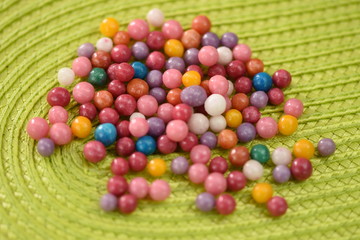 Fototapeta na wymiar Heap of sugared colorful sweet dragees as a background
