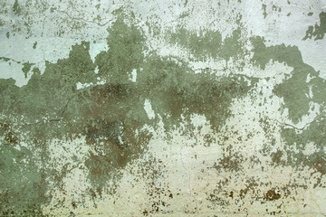Old damaged wall with cracked paint