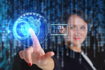 The concept of business, technology, the Internet and the network. A young entrepreneur working on a virtual screen of the future and sees the inscription: Data leak
