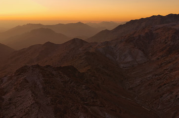 Fototapeta na wymiar Beautiful morning landscape of Mount Sinai (Mount Horeb, Gabal Musa, Moses Mount) during sunrise. Sinai Peninsula of Egypt. Pilgrimage place and famous touristic destination