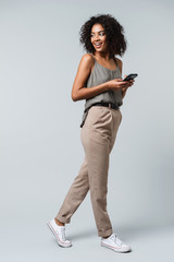 Full length of a happy young african woman