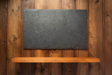 slate stone at wooden background