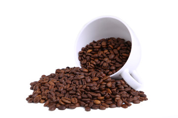 Coffee beans in cup isolated on white background.