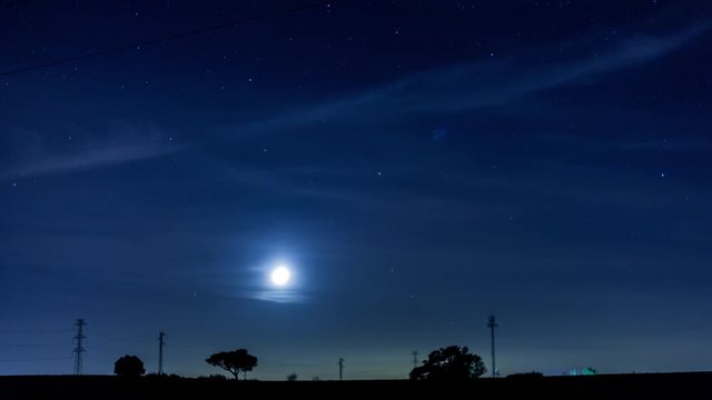 Amazing time-lapse of stars and moon in the night moving