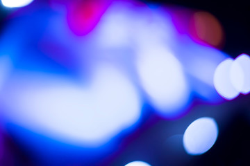 Bokeh background of blue colored lights of Christmas.