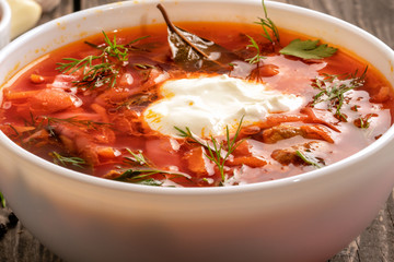 photo for menu, Russian borscht with sour cream garlic pepper and sauce, Ukrainian borscht with sour cream