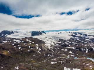 Obraz premium Mountains with snow and glaciers. Road Sognefjellet, Norway