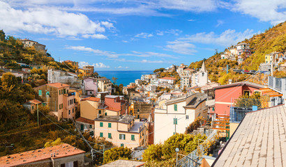 Fototapeta na wymiar Autumn view of Riomaggiore town and Ligurian Sea
