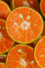 Fototapeta na wymiar Orange Slices for sale at the market