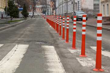 Obraz premium Road orange signs in a highway on reconstruction