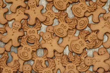 Homemade gingerbread cookies on wooden table