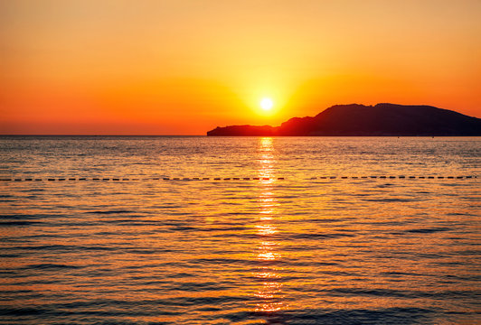 paradise image of sunset over the sea and isle 