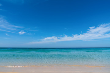 Fototapeta na wymiar Beautiful tropical beach and blue sky at Phuket ,Thailand ,Nai Harn Beach
